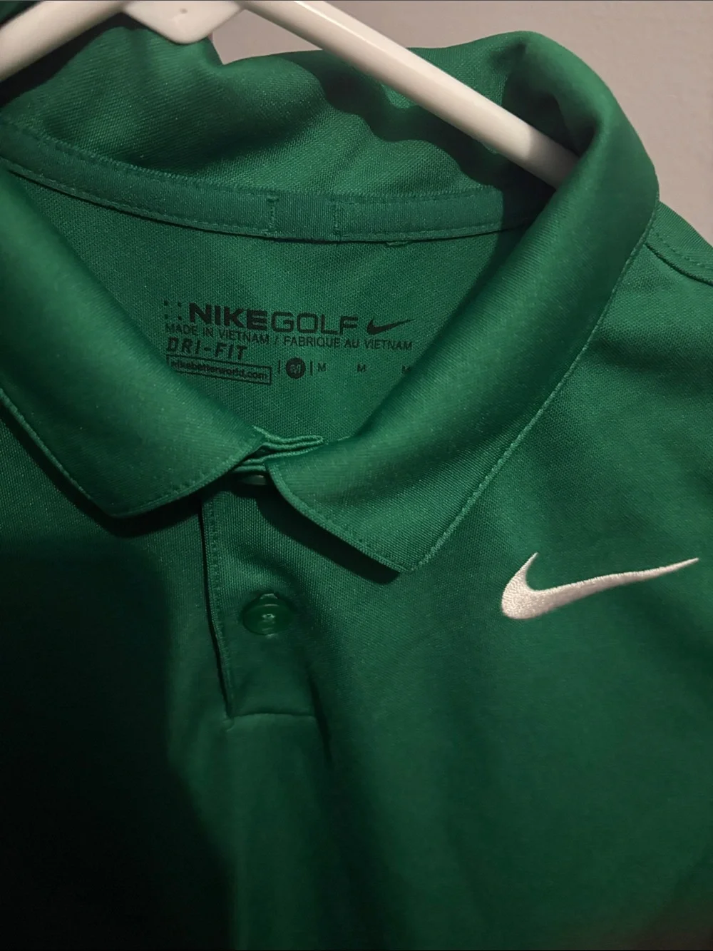 Youth Nike dri-fit Green Short-Sleeve Golf Polo with White Swoosh